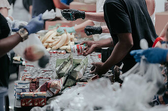 people helping at a food bank