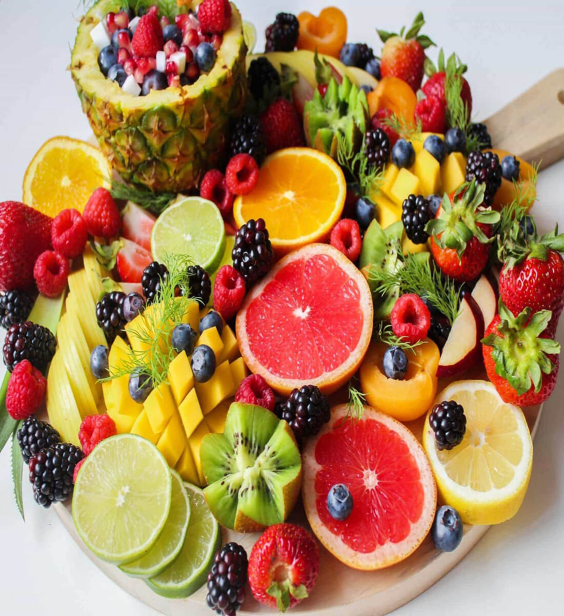 a bunch of fruit piled together.